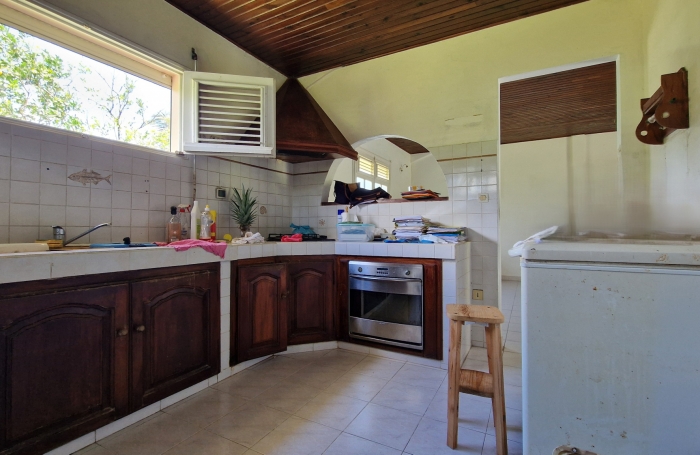 À vendre : Belle maison de plain-pied avec jardin arboré, quartier résidentiel calme à AJOUPA BOUILLON